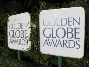 Men will wear all black to Golden Globes - Golden Globes Sign